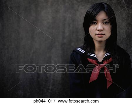 Portrait of a Asian woman in uniform View Large Photo Image Stock Photo - Portrait of a Asian woman in uniform. Fotosearch