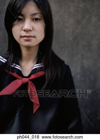 Portrait of a Asian woman in uniform View Large Photo Image Stock Photo - Portrait of a Asian woman in uniform. Fotosearch