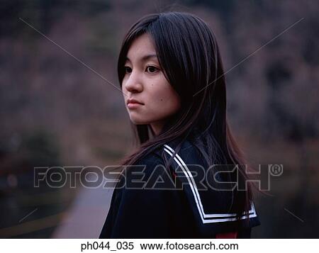 Portrait of a Asian woman in uniform View Large Photo Image Stock Photography - Portrait of a Asian woman in uniform. Fotosearch
