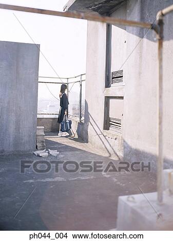 School girl at the roof top View Large Photo Image Picture - School girl at the roof top. Fotosearch