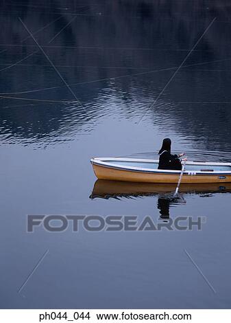 School girl rowing a boat View Large Photo Image Picture - School girl rowing a boat. Fotosearch