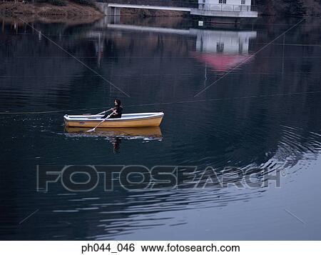 School girl rowing a boat View Large Photo Image Stock Photograph - School girl rowing a boat. Fotosearch