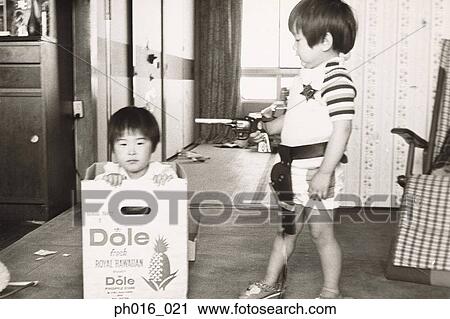 Boys playing toys at home View Large Photo Image Stock Image - Boys playing toys at home. Fotosearch