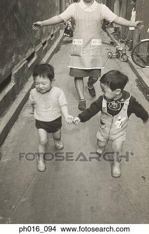 Boys running in an alley View Large Photo Image Picture - Boys running in an alley. Fotosearch