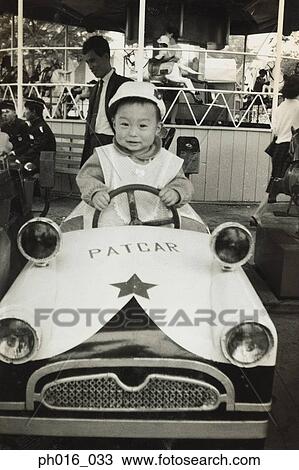 Girl on amusement car ride View Large Photo Image Stock Image - Girl on amusement car ride. Fotosearch
