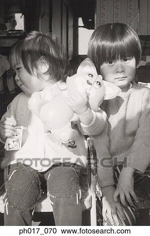 Brother and sister at home View Large Photo Image Stock Image - Brother and sister at home. Fotosearch
