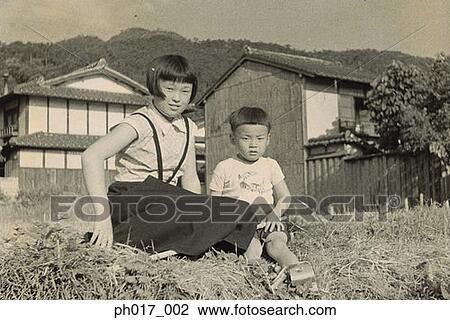 Elder Sister and younger brother at the backyard View Large Photo Image Stock Image - Elder Sister and younger brother at the backyard. Fotosearch