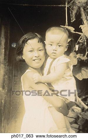 Elder sister and younger brother View Large Photo Image Stock Image - Elder sister and younger brother. Fotosearch