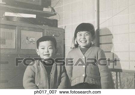 Elder sister and younger brother View Large Photo Image Stock Photo - Elder sister and younger brother. Fotosearch