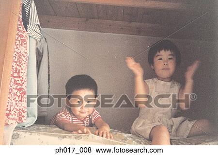 Elder sister and younger brother View Large Photo Image Stock Photo - Elder sister and younger brother. Fotosearch