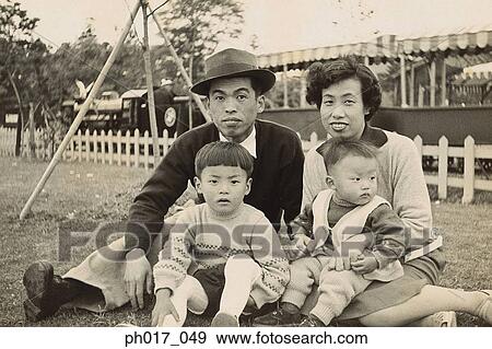 Family at the park View Large Photo Image Stock Photo - Family at the park. Fotosearch