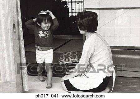 Mother and son at home View Large Photo Image Stock Image - Mother and son at home. Fotosearch