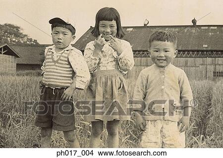 Picture - Portrait of brother and sisters. Fotosearch