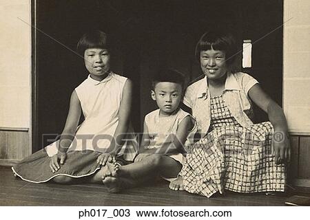 Stock Image - Portrait of brother and sisters. Fotosearch