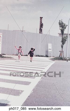 School children crossing the road View Large Photo Image Stock Photography - School children crossing the road. Fotosearch