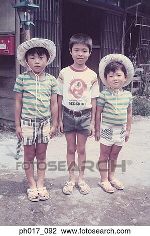 Three brothers at front yard View Large Photo Image Stock Image - Three brothers at front yard. Fotosearch