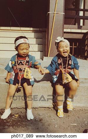 Twin brothers in Japanese costume View Large Photo Image Stock Photo - Twin brothers in Japanese costume. Fotosearch