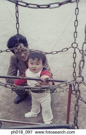 Father holing the baby boy View Large Photo Image Stock Photo - Father holing the baby boy. Fotosearch