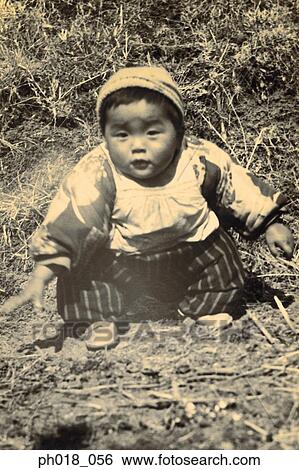 Stock Photograph - Portrait of a baby boy in traditional Japanese costume. Fotosearch