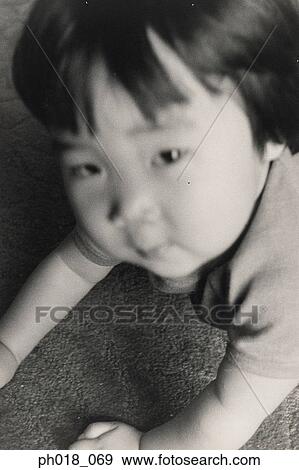 Portrait of a baby girl View Large Photo Image Stock Photo - Portrait of a baby girl. Fotosearch