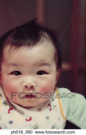 Stock Image - Portrait of a baby. Fotosearch