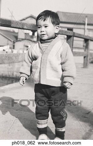 Portrait of a young boy View Large Photo Image Stock Image - Portrait of a young boy. Fotosearch