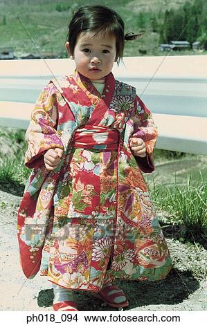 Portrait of a young girl in traditional Japanese costume View Large Photo Image Picture - Portrait of a young girl in traditional Japanese costume. Fotosearch