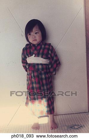 Portrait of a young girl in traditional Japanese costume View Large Photo Image Stock Image - Portrait of a young girl in traditional Japanese costume. Fotosearch