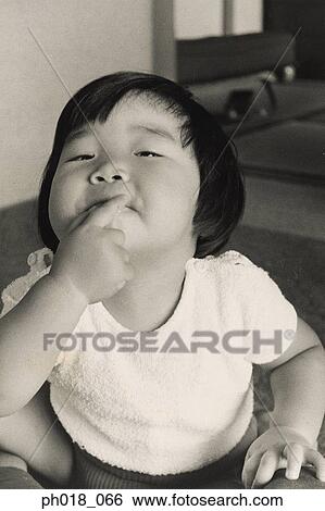 Portrait of a young girl View Large Photo Image Stock Photograph - Portrait of a young girl. Fotosearch