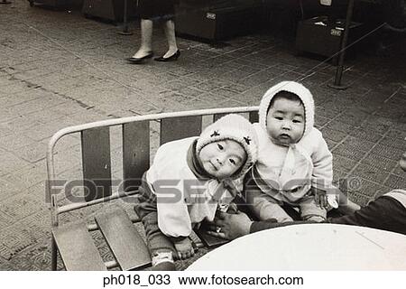 Portrait of twin babies View Large Photo Image Stock Image - Portrait of twin babies. Fotosearch