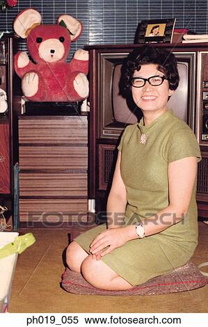 An Asian woman in the living room View Large Photo Image Stock Photography - An Asian woman in the living room. Fotosearch
