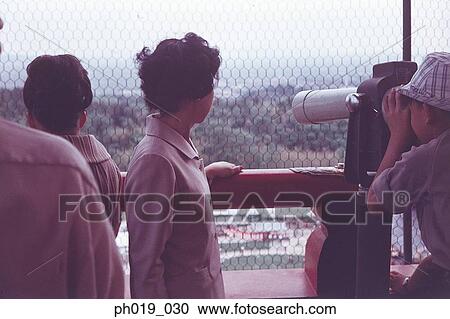Group of people looking at the scenery View Large Photo Image Stock Image - Group of people looking at the scenery. Fotosearch