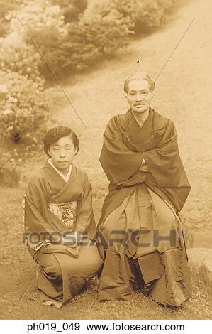 Portrait of a Japanese couple in traditional Japanese costume View Large Photo Image Stock Photo - Portrait of a Japanese couple in traditional Japanese costume. Fotosearch