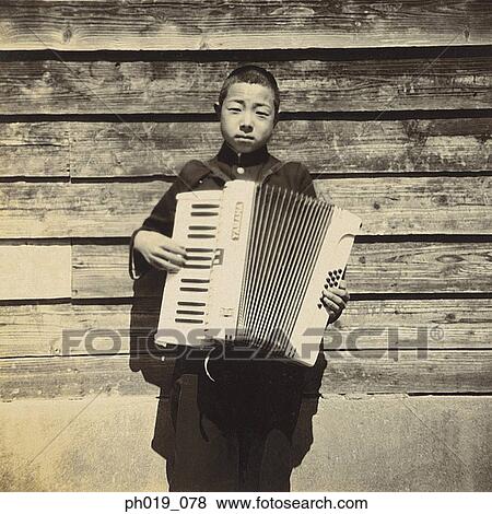 Portrait of a Japanese student playing Accordion View Large Photo Image Stock Photo - Portrait of a Japanese student playing Accordion. Fotosearch