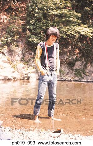 Portrait of a young Asian man View Large Photo Image Stock Image - Portrait of a young Asian man. Fotosearch
