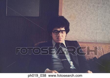 Portrait of an Asian man in business attire View Large Photo Image Stock Photo - Portrait of an Asian man in business attire. Fotosearch
