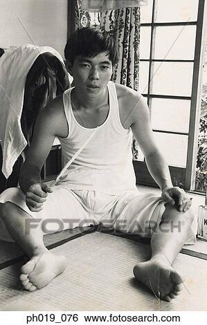 Portrait of an Asian man in pajamas View Large Photo Image Stock Photograph - Portrait of an Asian man in pajamas. Fotosearch
