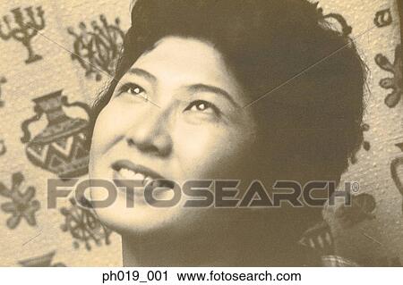 Stock Image - Portrait of an Asian woman. Fotosearch