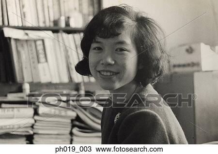 Stock Image - Portrait of an Asian woman. Fotosearch