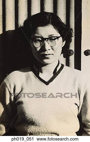 Stock Image - Portrait of an Asian woman. Fotosearch