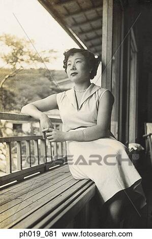 Stock Image - Portrait of an Asian woman. Fotosearch