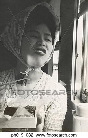 Stock Image - Portrait of an Asian woman. Fotosearch