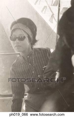 Stock Photograph - Portrait of an Asian woman. Fotosearch