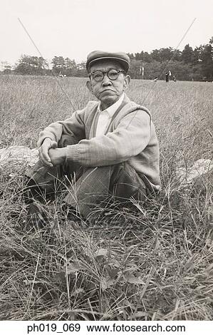 Stock Photo - Portrait of an elderly Asian man. Fotosearch