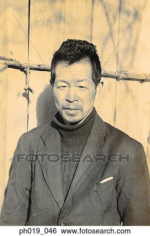 Stock Photograph - Portrait of an elderly Asian man. Fotosearch