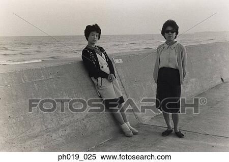 Portrait of two Asian women View Large Photo Image Stock Photography - Portrait of two Asian women. Fotosearch