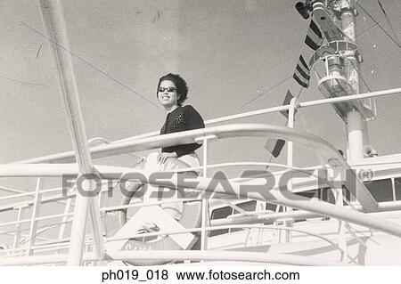 Stock Photo - Woman on the cruise ship. Fotosearch
