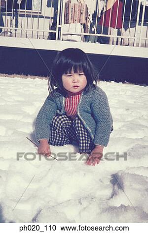 Girl playing with snow View Large Photo Image Stock Image - Girl playing with snow. Fotosearch