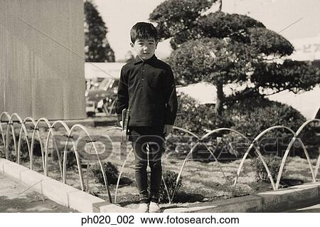 Portrait of a boy at garden View Large Photo Image Stock Image - Portrait of a boy at garden. Fotosearch