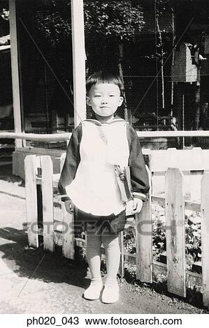 Portrait of a boy at garden View Large Photo Image Stock Image - Portrait of a boy at garden. Fotosearch